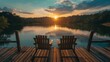 © wannakorn - Sunset Over Lake with Two Chairs on a Wooden Dock.