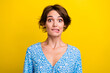 © deagreez - Photo of doubtful unsure young lady dressed flower print top biting lip isolated yellow color background