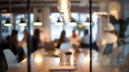 Canvas Print - Corporate team meeting in a modern office, executives and managers around the table, engaged in discussion, blurred faces, collaborative workspace