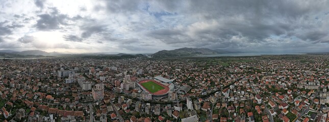 Skadar historical city with surrounding mountains and Skadar lake,Shkoder,Albania,Balkan,Europe,aerial panorama landscape view, cityscape