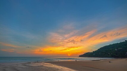 Wall Mural - time lapse amazing colorful cloud in beautiful sunset above the sea.
beautiful sunrise landscape amazing light of nature sky over horizon.
colorful sky sunset or sunrise background.