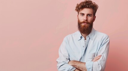 a stylish bearded man in casual attire, posing confidently against a soft pink background, radiating charm and suitable for highlighting text or graphic elements