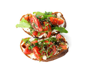 Delicious bruschettas with ricotta cheese, tomatoes and arugula isolated on white, top view