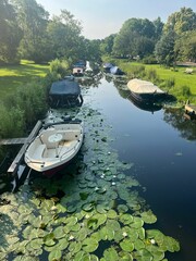 Canvas Print - Picturesque view of canal with moored boats