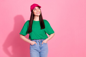 Canvas Print - Photo of charming positive woman wear green t-shirt pink cap smiling looking empty space isolated pink color background