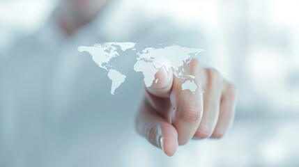 Wall Mural - A person is pointing at a map of the world