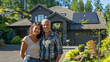 © Den b+f - couple in front of house in garden, solar panels