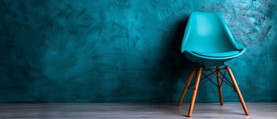 Sticker -  A blue chair atop a hardwood floor, adjacent to a green wall A wooden chair likewise sits on the hardwood floor