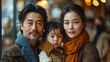 © Five Million Stock - Portrait of a Korean family with parents and their young toddler kid at happy home