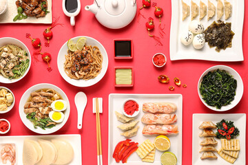 Wall Mural - Composition with different Chinese food on red background