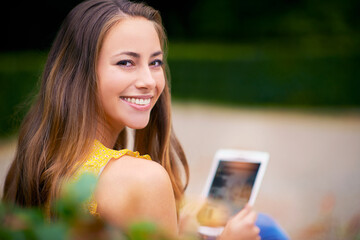 Canvas Print - Portrait, woman and tablet outdoor for reading, research and networking for school project. College student, happy and technology or screen in park for social media, communication or online for ebook