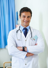 Wall Mural - Portrait, doctor and man with arms crossed, healthcare and happy for first day in hospital, proud and expert. Clinic, medical professional and confidence of person, smile and lab coat for employee