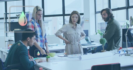 Canvas Print - Image of ecology icons over diverse colleagues having meeting in office