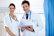 © Beak/peopleimages.com - Doctors, portrait and tablet for consulting support on clinic website, update and review medicine. Staff, assistance and medical collaboration for treatment or diagnosis, surgery schedule and team