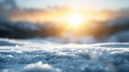 A snow covered field with a bright sun in the sky