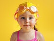 © Alexander Chaykin - A young child in a pink swimsuit with goggles, ready for water fun