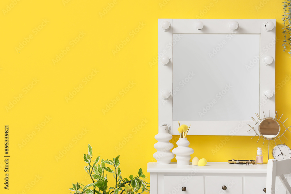 Makeup table with mirrors in dressing room
