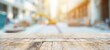 © Katawut - Wooden Tabletop With Blurred Construction Site Background.