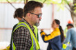 © Poguz.P - Caucasian engineer man, Site manager worker and builder on construction site, Engineer and foreman worker team inspect the construction site