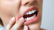 © easybanana - A woman with a toothache is biting her lip. Concept of discomfort and pain