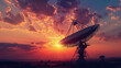 © Agata25 - Sunset Silhouette of Large Satellite Dish Transmitting Signals