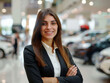 © wiparat - Portrait of beautiful business person smiling consultant in car salon. Car dealer in showroom