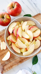 Sticker - Apple slices filled in bowl placed on chopping board, vertical