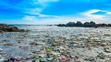 Trash, plastic cups and plastic bags at the beach. environmental problem concept and healing the world
