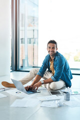 Poster - Man, portrait and typing on laptop on floor in office for research, information and brainstorming of financial growth. Male person, digital and paperwork with chart, data analysis and startup budget