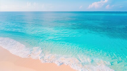 Poster - Turquoise Ocean Waves Crashing on a Sandy Beach.