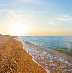 Wall Mural - sandy sea beach at the sunset