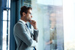 © Chanelle2000/peopleimages.com - Corporate man, thinking and window in office for business investment, brainstorming and company growth. Financial director, vision and planning in workplace for career development, goals and proposal