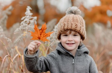 Child Holding Autumn Leaf