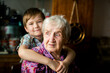 © De Visu - Psychological portrait of an elderly woman with her grandson.