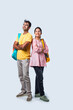 © StockImageFactory - Two Happy Indian College Students with Bags and Laptop, Isolated on White Background