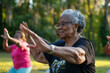 © Michael - Elderly Women Enjoying Outdoor Exercise Class: Perfect For Health And Wellness Campaigns Or Senior Living Promotions