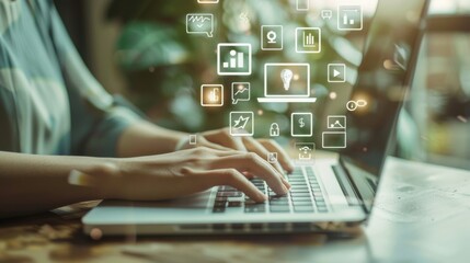 A woman is typing on a laptop with a screen that has a lot of icons and graphics