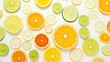 © Putt_Sanplee - A refreshing medley of citrus fruits, including lemons, limes, and oranges, sliced and arranged in a geometric pattern on a clean white background.
