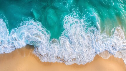 Sticker - Aerial View of Turquoise Ocean Waves Crashing on Sandy Beach - This breathtaking aerial photograph captures the beauty of the ocean, showcasing the turquoise waters crashing onto a pristine sandy beac