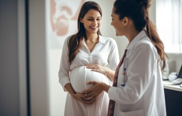 Happy pregnant woman visit gynecologist doctor at hospital 