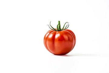 Wall Mural - Single Red Tomato on White Background