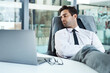 © Chanelle2000/peopleimages.com - Burnout, laptop and sleeping with business man at desk in office for break, dreaming or rest. Fatigue, computer and tired with exhausted employee in professional workplace for administration deadline