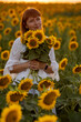 © Олег Мальшаков - Beautiful young girl in a white dress in sunflowers