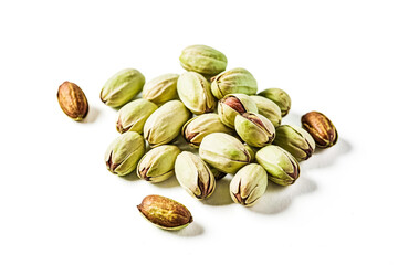 Canvas Print - Close-up of Green Pistachios on a White Background