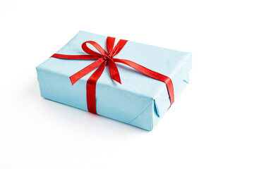 Canvas Print - Blue Gift Box with Red Ribbon Isolated on White Background