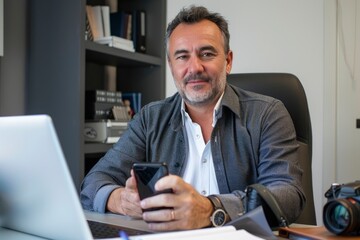 Poster - Middle aged businessman looking at camera working holding smartphone. Mature 45 years old business man executive, business owner or entrepreneur sitting at desk using mobile cell phone - generative ai