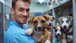 © daniel - Young handsome adult male worker in animal shelter
