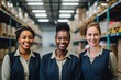 © Baba Images - Group portrait of diverse female warehouse workers smiling