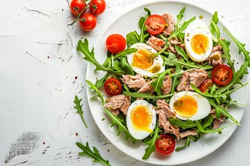 Poster - Healthy food Tuna tomatoes eggs arugula mustard on white background top view