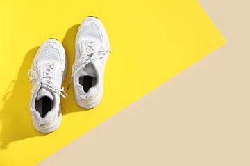 Wall Mural - Stylish male white sneakers on colorful background